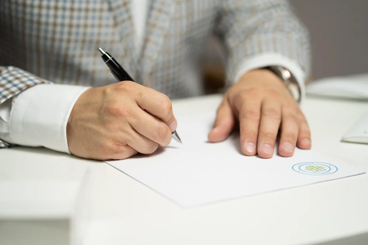 man, sign, paper, write, document, contract, signing, agreement, signature, signing document, signing contract, signing paper, sign, contract, contract, contract, contract, contract, signing, agreement, signature, signature. Photo rights documents compared: copyright, licenses, permissions, and releases