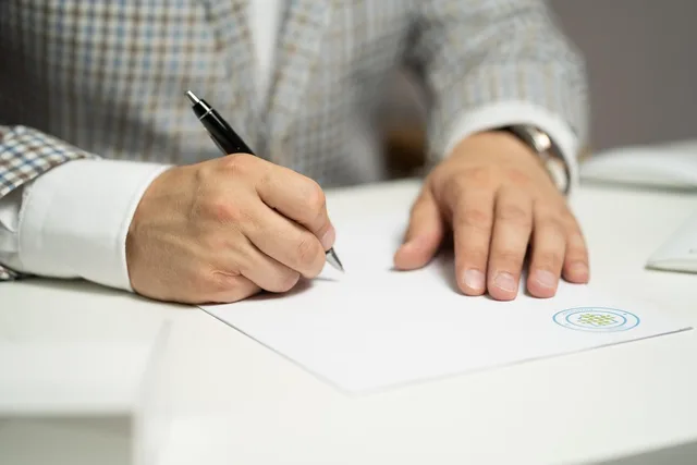 man, sign, paper, write, document, contract, signing, agreement, signature, signing document, signing contract, signing paper, sign, contract, contract, contract, contract, contract, signing, agreement, signature, signature. Photo rights documents compared: copyright, licenses, permissions, and releases